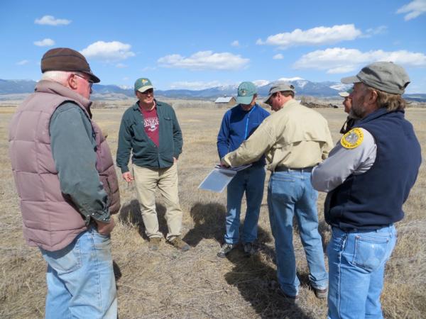 April 2015.  Headwater and Gallatin PF Chapters meet with FWP officials at Canyon Ferry WMA to discuss spring seeding project.